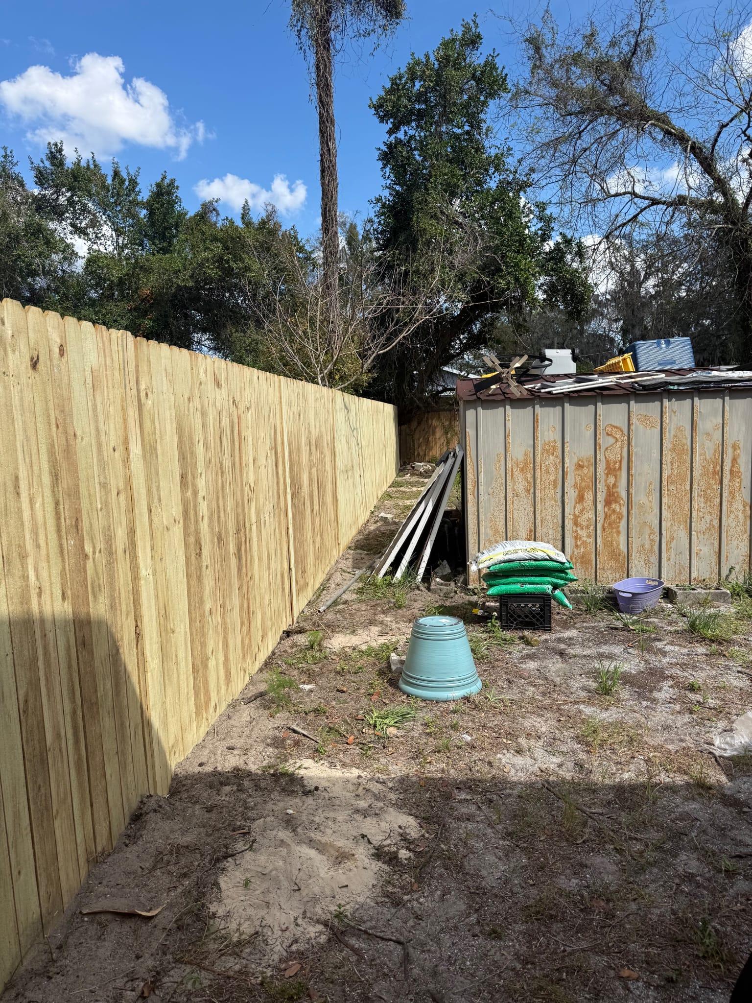 Wood fence in progress